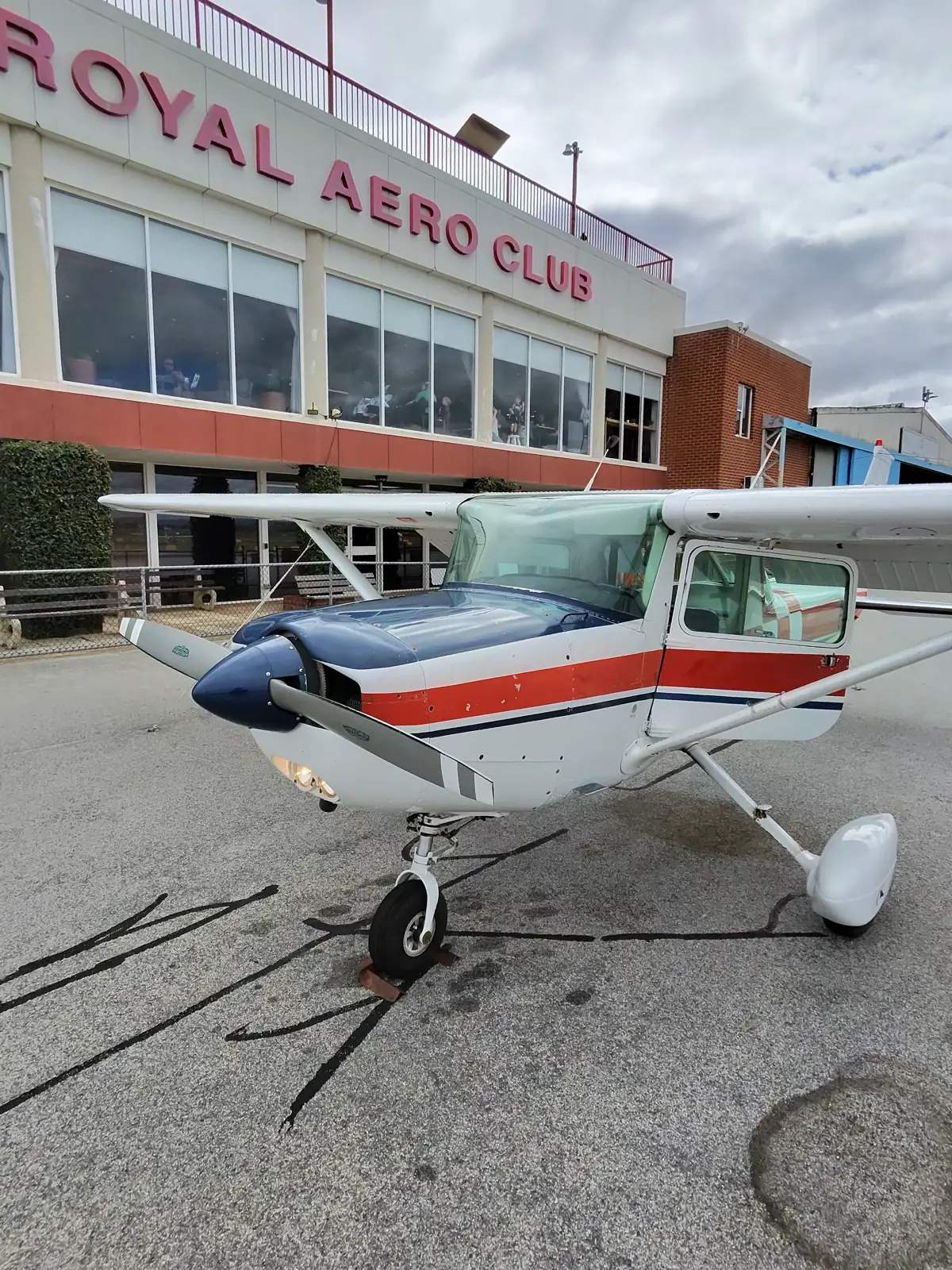 A light aircraft outside the Royal Aero Club