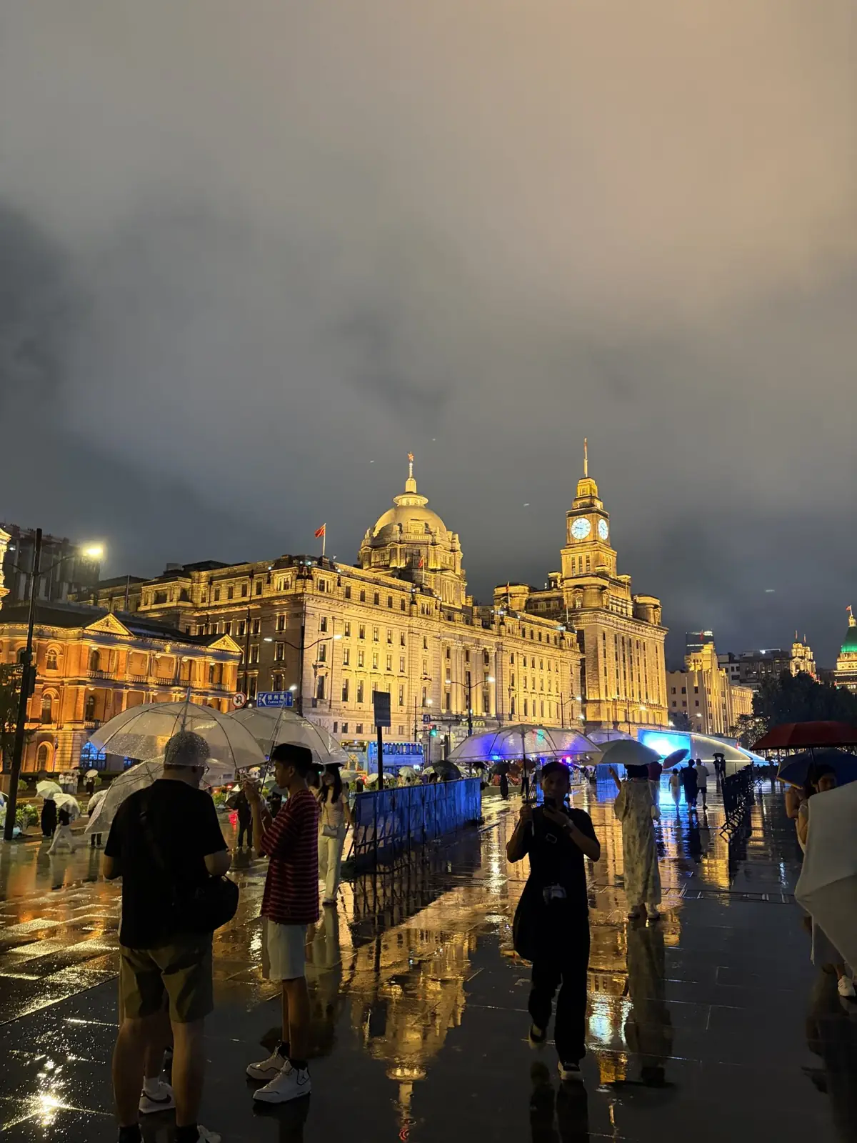 The Bund lit up at night after the rain